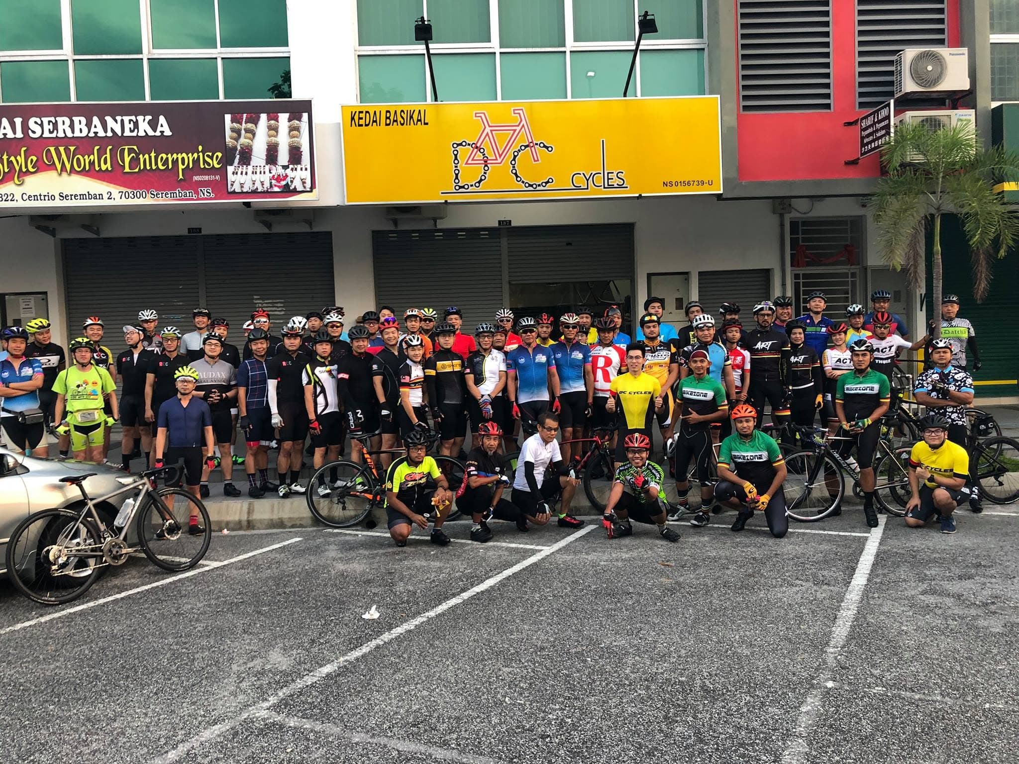 A DC Cycles weekend group ride — road cyclists rolling out together around Seremban